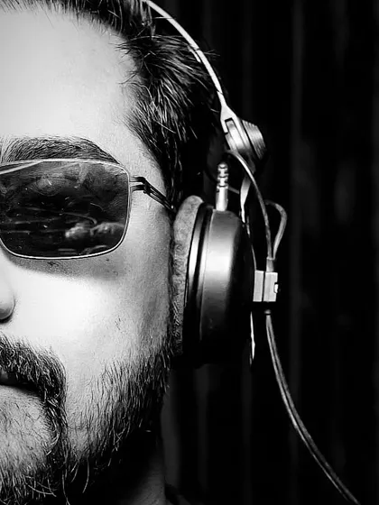 Behind the music, it's all about the focus and the mystery. This is a shot that captures my persona as an artist, always listening and searching for the next beat.