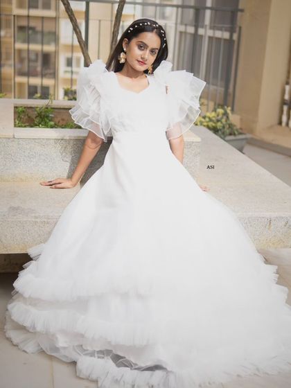 The Dress Bank - Wedding & Special Occasion Outfit Rentals White Wedding Gowns photo 7