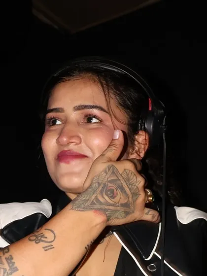 A candid moment at The Thief, Chennai. The eye tattoo on my hand is part of my personal brand and spiritual connection.