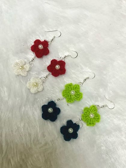 A set of my mini flower earrings in different colors. These simple, beaded floral earrings are great for everyday wear.