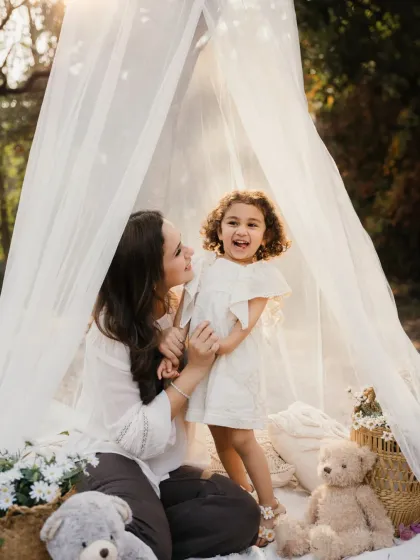 A moment of pure laughter between a mother and her daughter. This is the kind of joy I love to capture.
