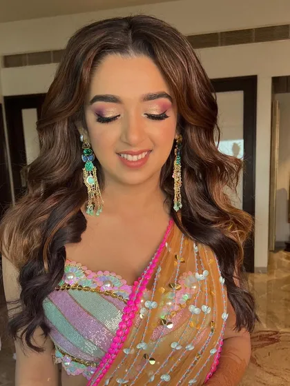 Another lovely portrait of the bride, smiling and glowing for her Mehendi ceremony.