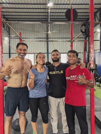 A post-competition photo with the team and coach, all smiles after a hard-fought event. This is what being part of the Mettle family is all about.
