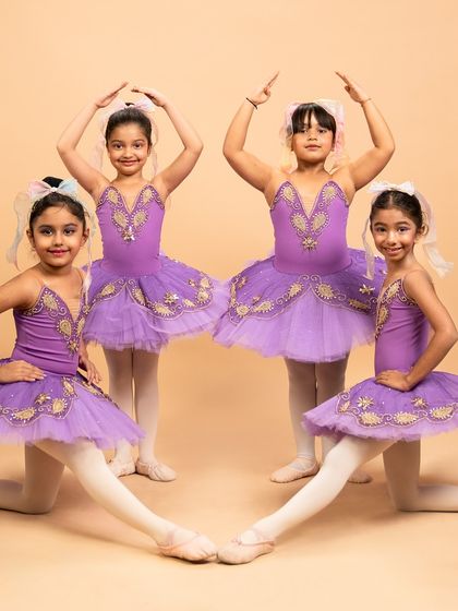 More beautiful poses from our 'Coppélia Reimagined' piece. These young dancers masterfully blend whimsical, doll like nuances with the foundational grace of ballet.