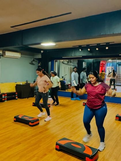 Our members in the middle of a challenging but rewarding step routine. You can see the energy and determination in the room.