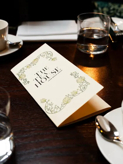 A shot of the menu at The Tea House by Bread Ahead in London. It sets the scene for a quintessential, cozy high tea experience before even showing the food.