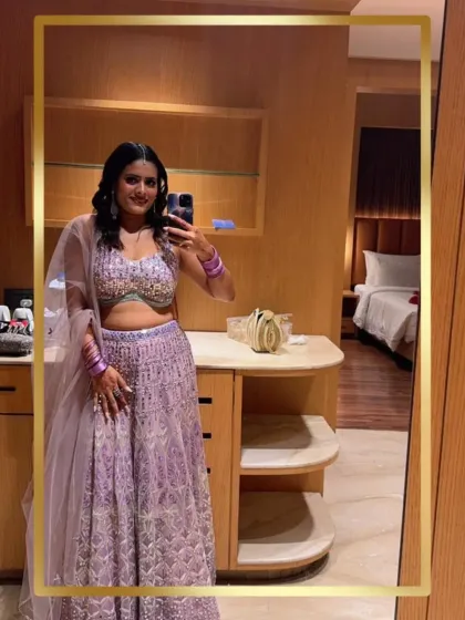 A mirror selfie from a happy client in the lavender lehenga, showing how great you can look and feel in one of my rental pieces.
