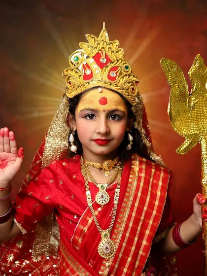 Another powerful pose of my daughter as Maa Durga. These photos are a celebration of strength, devotion, and new beginnings.