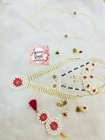 Another variation of the red and white halwa jewellery set, showing the different pieces available for customization.