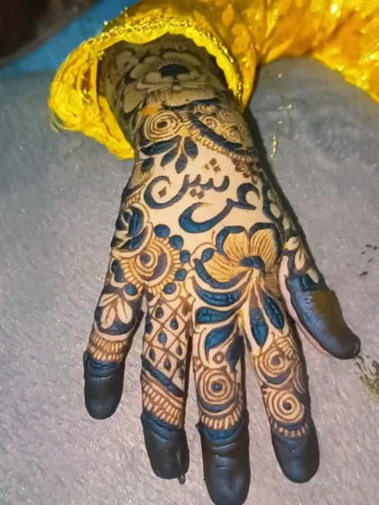 The final look of the floral henna for my niece, with the rich, dark stain.