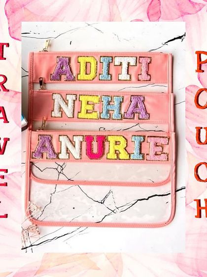 A stack of our clear travel pouches, showing the different color borders and patch options available.