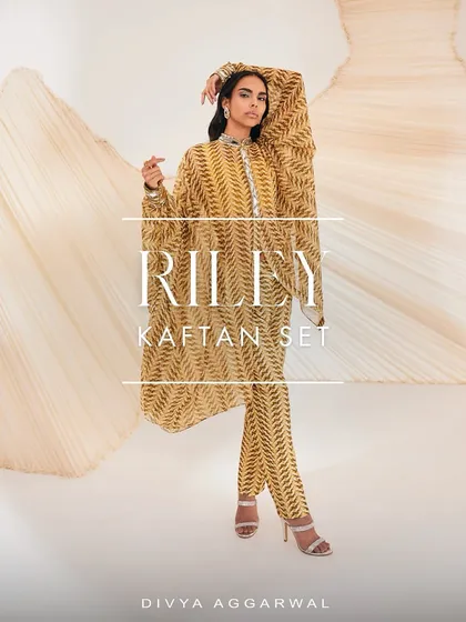 The Riley Kaftan Set, where prints resemble tropical freshness and pintuck detailed pants steal endless compliments.