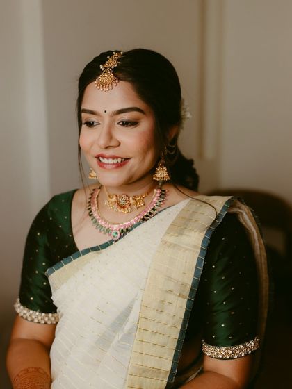 A happy portrait of a bride-to-be, her smile lighting up the frame. This shot captures the excitement and joy of her engagement.