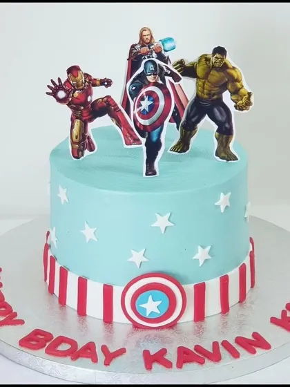 Avengers assemble! This superhero-themed cake features Iron Man, Captain America, Thor, and the Hulk, ready for action. It's a perfect choice for a fan of the Marvel universe.