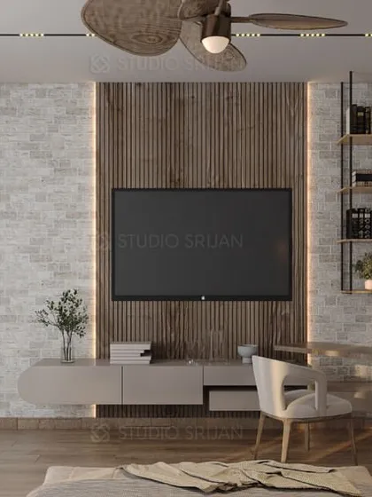 The TV wall in the same bedroom combines a white brick texture with wooden fluting, creating a visually interesting and balanced composition.