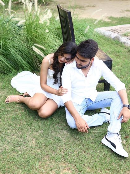 A sweet and intimate shot from a pre-wedding shoot, featuring our versatile white dress.