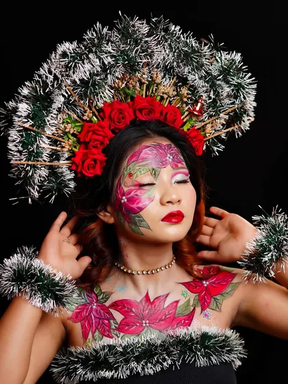 A beautiful pose from the Christmas fantasy shoot, with the model's eyes closed to showcase the floral painting on her face.