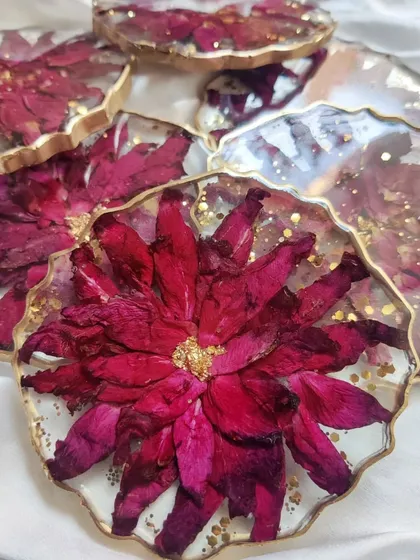 Capturing everlasting love in a set of floral coasters. These were made by preserving a client's special flowers, turning them into functional art that can be used and cherished every day.