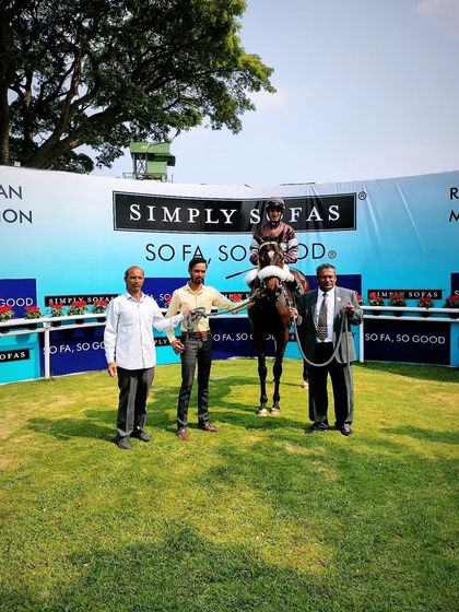 'The Whisper Quietly' after winning The Leading Stud Cup.