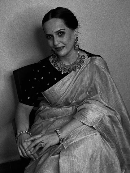 A classic black and white portrait that captures the vintage elegance of this look.