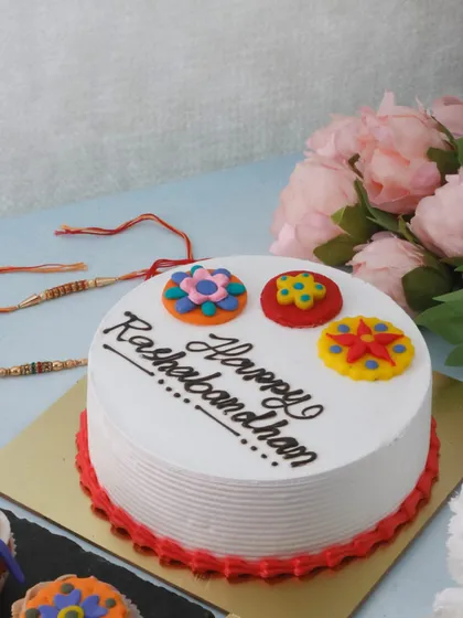 A classic Chocolate Vanilla Cake specially designed for Raksha Bandhan, perfect for celebrating with your siblings.
