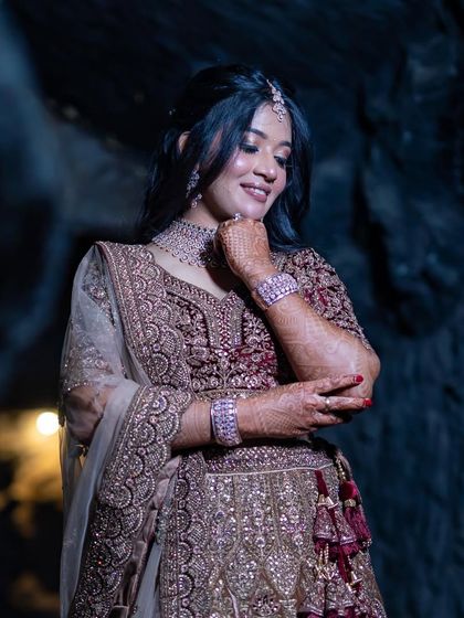 Our bride Bhoomika looks like a princess in her reception lehenga, paired with our sparkling diamond-look CZ jewellery set.