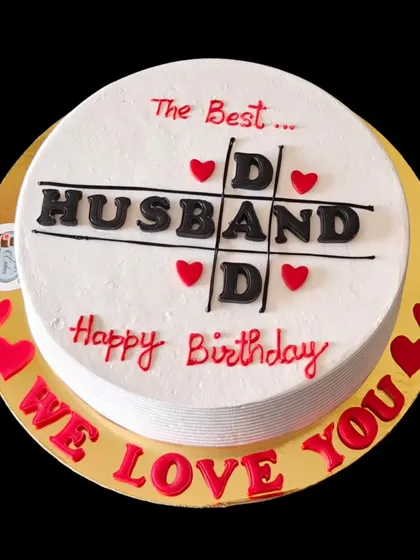 A clever tic-tac-toe cake celebrating the best "Husband" and "Dad". It's a sweet and personal design for a family man's birthday.