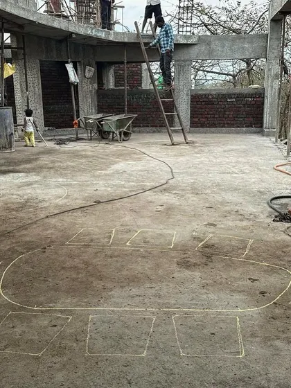 The layout for a custom interior element is chalked out on the floor. This full-scale drawing on site helps us and the artisans visualize the proportions and placement before construction.