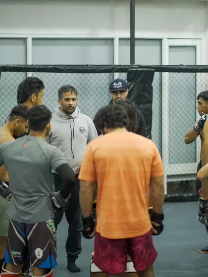 The team huddles up for instructions from the coaches. Strategy and communication are just as important as physical skill in our fight camps.