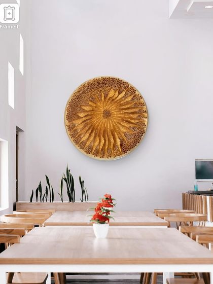 "The Golden Flower" in a bright, minimalist restaurant setting. Its organic shape adds warmth and a touch of nature to the space.