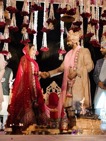 The phera ceremony, where the couple takes their sacred vows around the holy fire. The decor is designed to enhance the sanctity of this ritual.