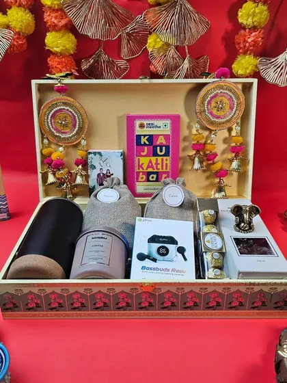 This is what a truly festive Diwali hamper looks like. We combined traditional elements like decorative hangings and a Ganesha idol with modern luxuries like wireless earbuds and gourmet treats, all presented in a beautifully crafted box.