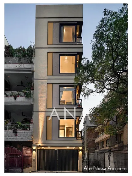 The front facade of the Yellow Line Apartment building. On a very narrow 15-foot wide plot, we used strong vertical and horizontal bands to create a sense of order and visual depth.
