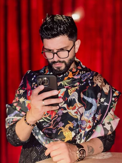 A candid moment, checking my phone before the show. Even the 'in-between' moments can be stylish.