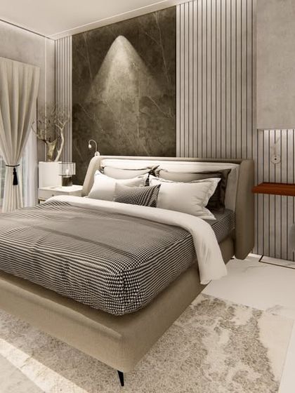 A bedroom design that combines a work-from-home space with a restful sleeping area. The room features a balcony, a textured marble accent wall, and a mix of direct and indirect lighting for a functional and stylish environment.