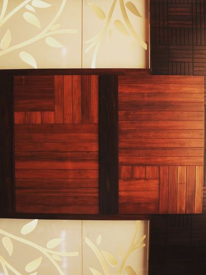 Another example of combining wood paneling with backlit decorative panels for a unique wall treatment.