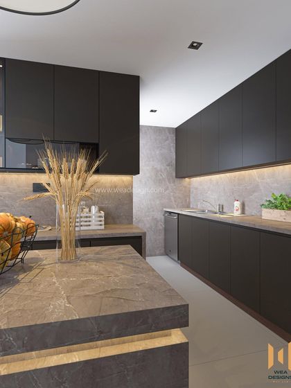 A wide view of the kitchen, showing how we expanded the space by removing walls to create a more open and functional layout.
