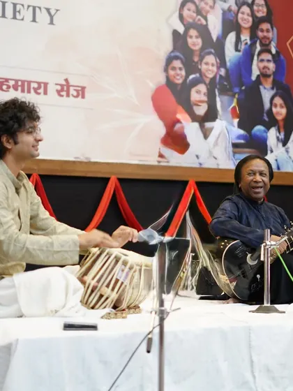 A happy moment during a sitar and tabla performance with Ustad Shahid Parvez Khan Sahab. The energy of a live audience makes every concert a unique experience.
