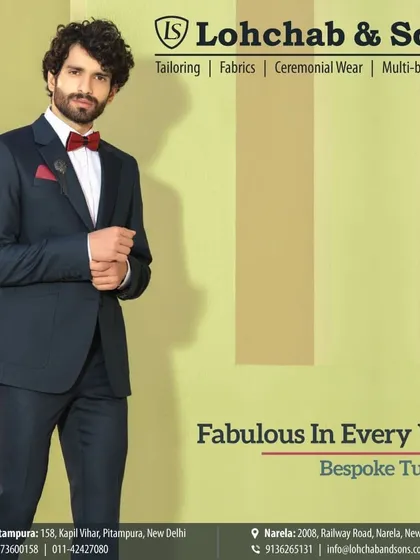 For moments that call for timeless elegance, we craft bespoke tuxedos. This classic navy blue two-piece suit, paired with a crisp white shirt and a striking red bow tie, is tailored for a sharp, modern silhouette perfect for receptions or black-tie events.