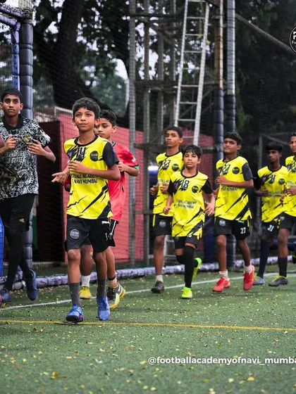 The team runs together during a warm-up, building fitness and unity before the session begins.