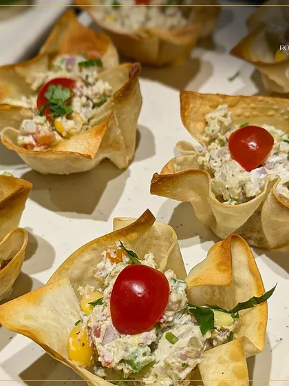 These crispy wonton cups are filled with a creamy and savory mixture, topped with a cherry tomato for a pop of color and freshness. They are a perfect example of how I create delicious, single-bite appetizers for easy mingling.