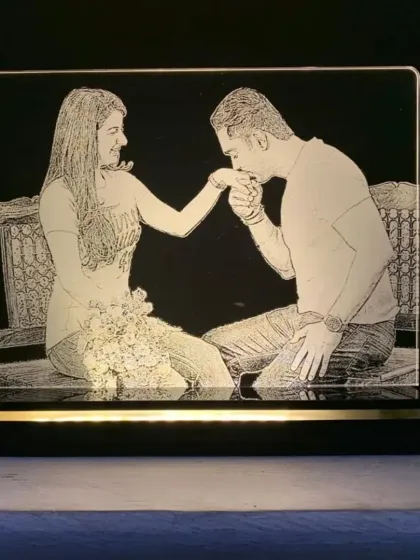Light up your favorite memories with my custom engraved acrylic lamps. I can etch any photo onto the plaque, which sits on an illuminated wooden base, creating a unique and romantic piece of decor for your room.