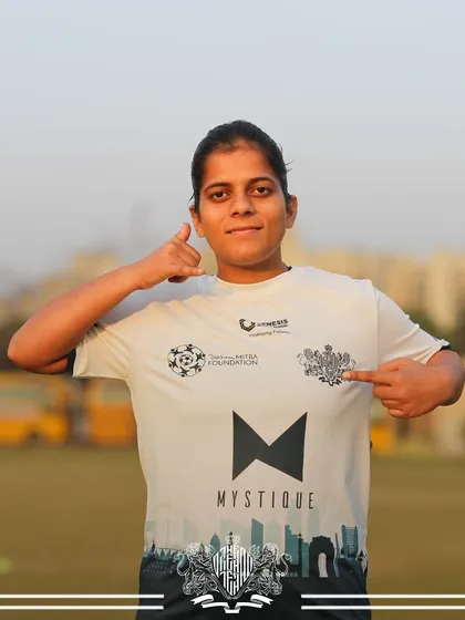 "Call me a champion." A player gestures to the team crest, a sign of pride and accomplishment.