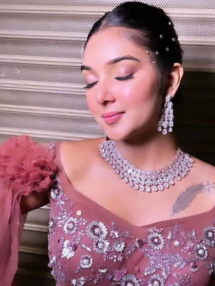 A close-up of the soft, shimmery eye makeup and flawless skin for this portfolio shoot. The look is glamorous yet feels light and radiant.