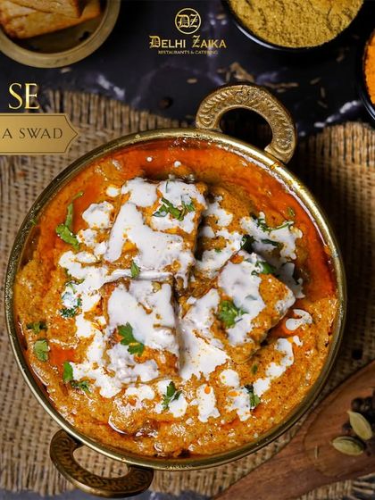 Dil se Dilli ka swad. This image captures the essence of our cooking, featuring a rich paneer gravy that represents the heart of Delhi's culinary traditions.