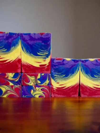 The vibrant swirls in this Rainbow Bloom soap are created using a special "One Pot Wonder" technique. I love experimenting with colors and pours to make each cold process bar a unique visual experience.