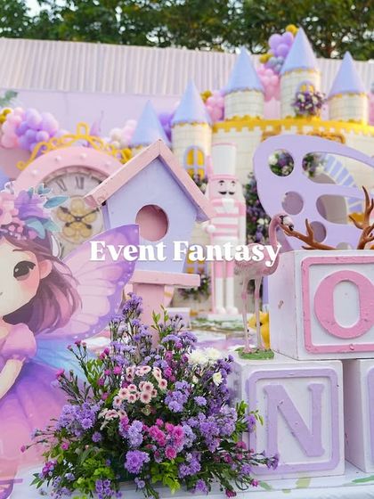 A cute fairy cutout and "ONE" blocks, part of the detailed decorations at Varnnika's magical first birthday.