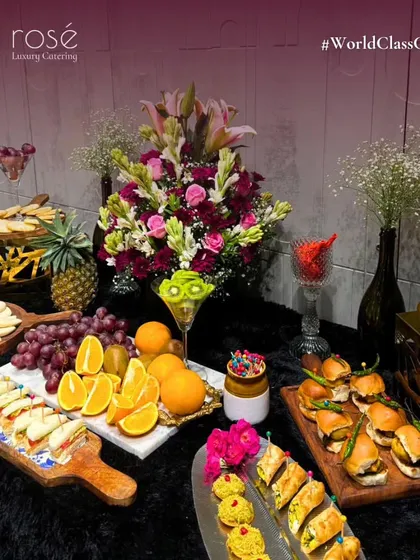 Another angle of our stunning grazing table, perfect for private affairs and extravagant galas. This setup showcases our unrivaled combination of sophistication, taste, and impeccable service.