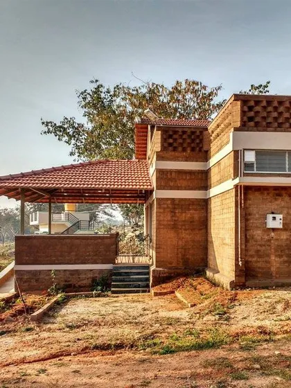 This is a real-world example of my principles in action. The building uses compressed stabilized earth blocks (CSEB) and a Mangalore tile roof, materials local to the region. This approach, known as vernacular architecture, reduces environmental impact and creates structures that are naturally suited to the climate.