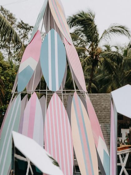 A closer look at the pastel surfboard installation, a perfect photo-op for a beach wedding sundowner.